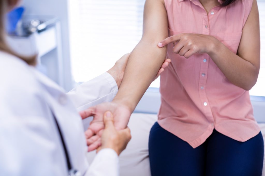 Doctor examining patient