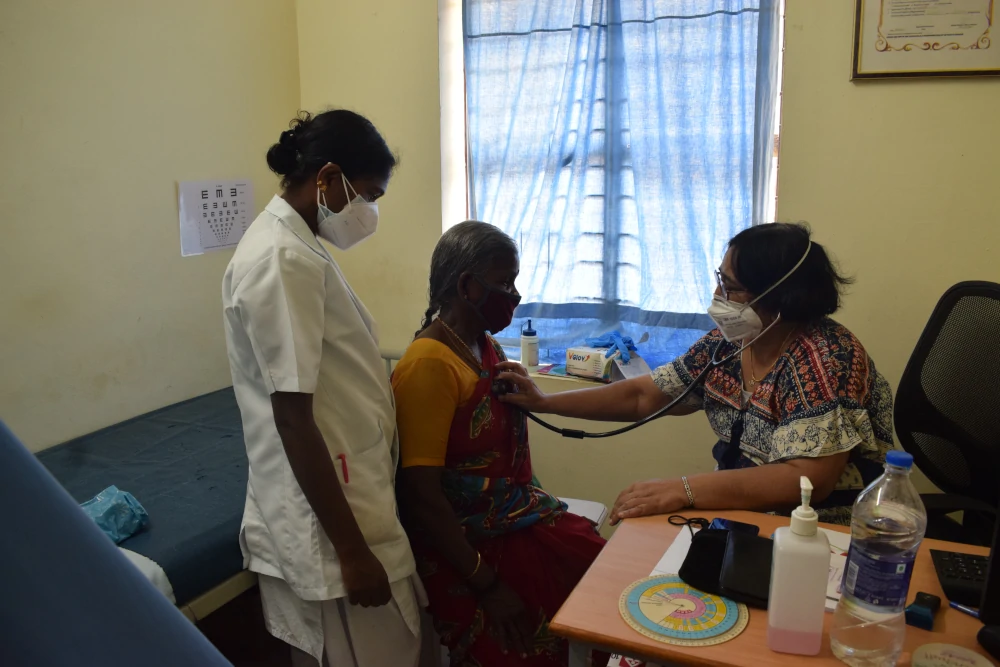 Doctor Examining Patient